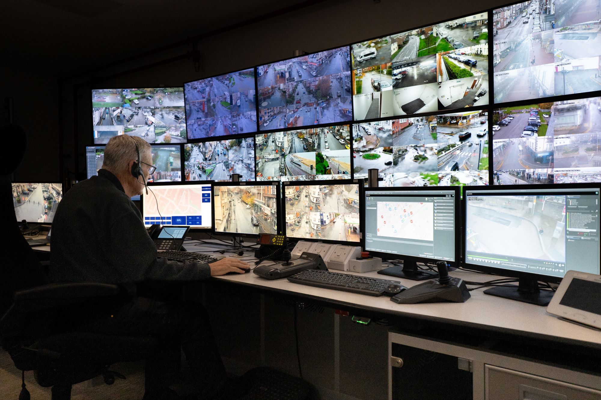 CCTV operator using control room equipment.